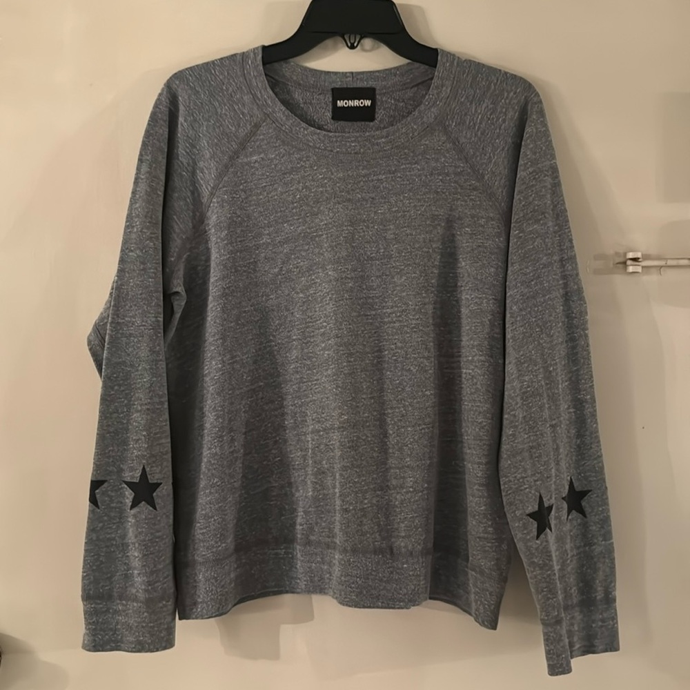 MONROW grey crewneck sweater with black stars on sleeve.Sz.L Like NEW condition